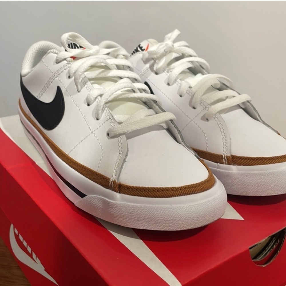 Nike courts fits women 7 1/2 - 8 comfortably.